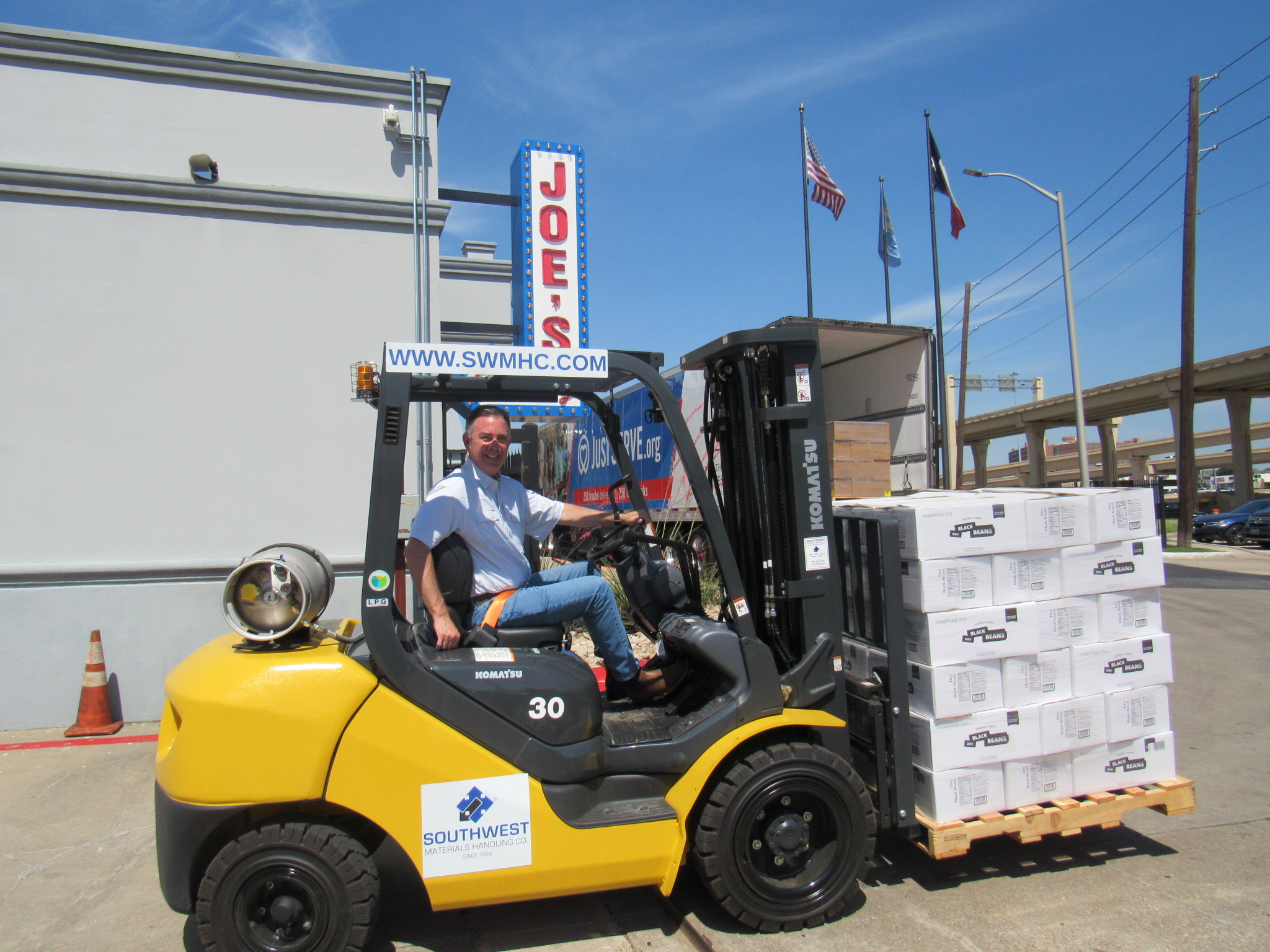 Catholic Charities Forklift Donation 2