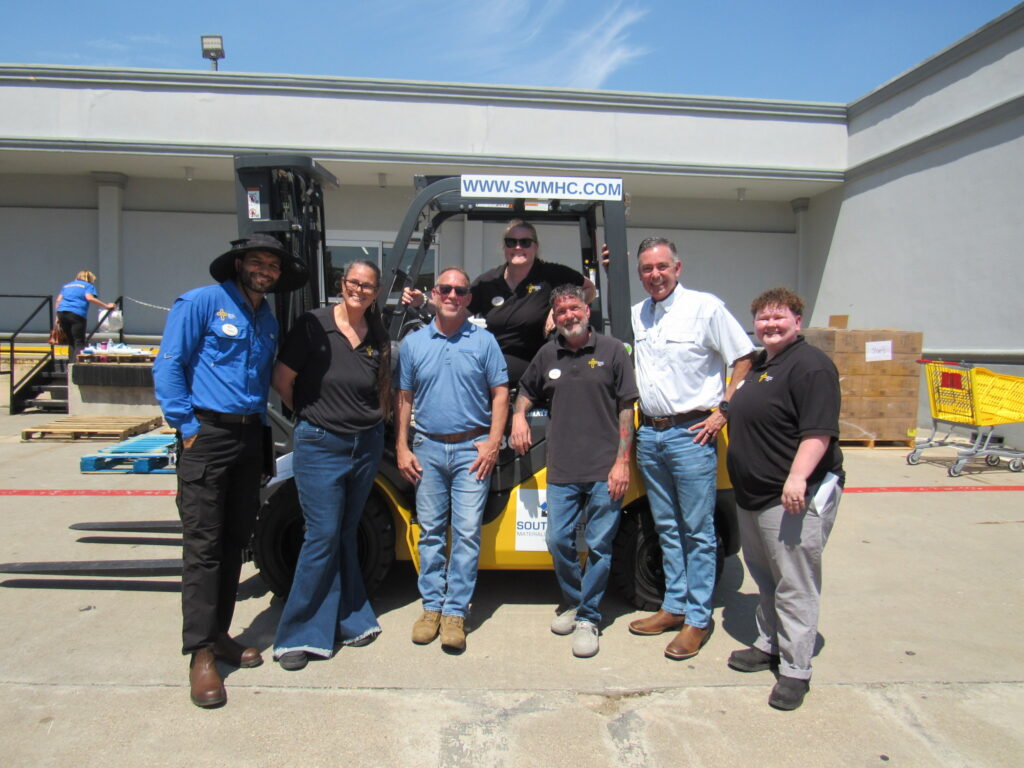 Catholic Charities team members with SWMHC